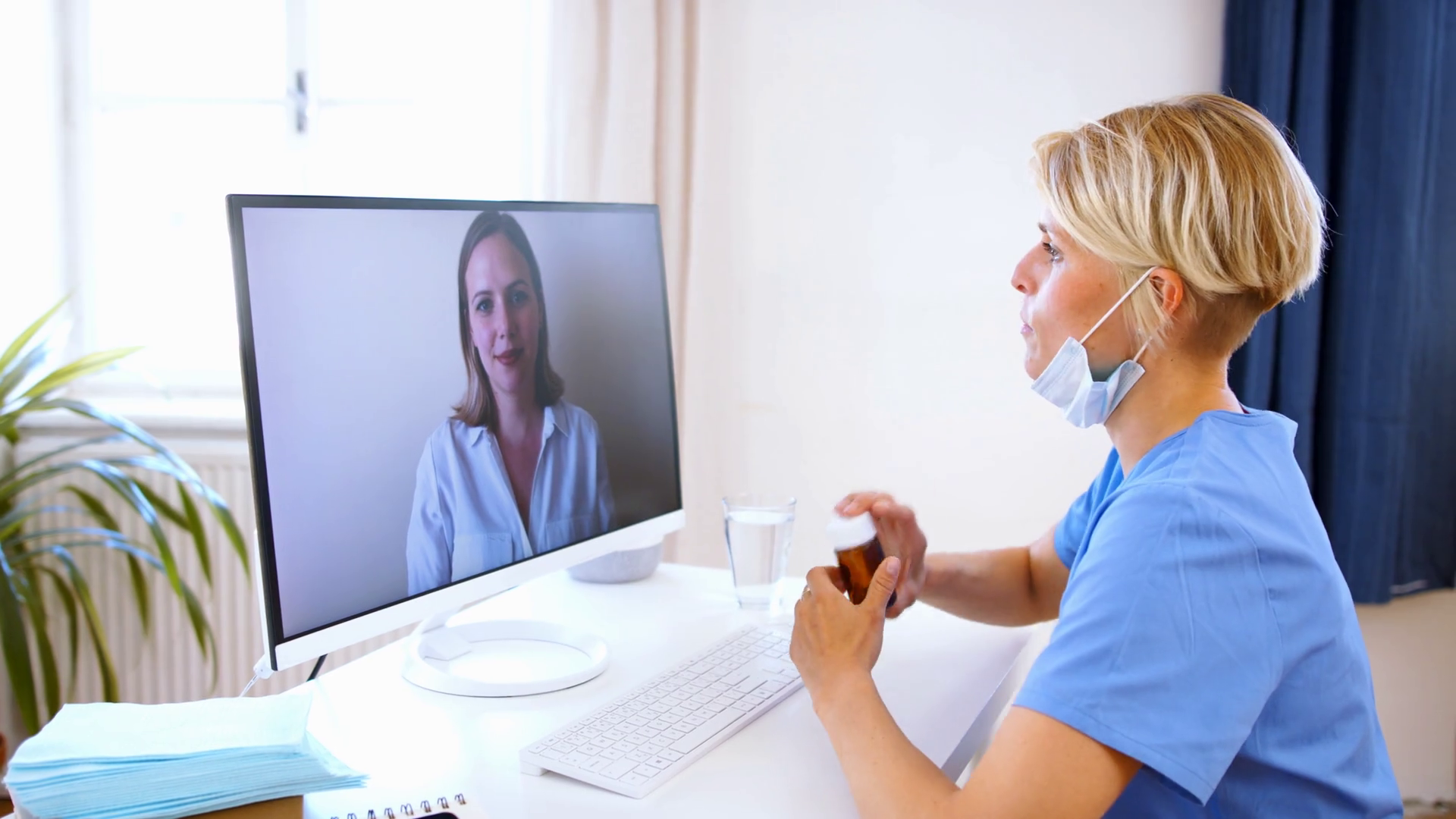 Screen showing patient-doctor video call